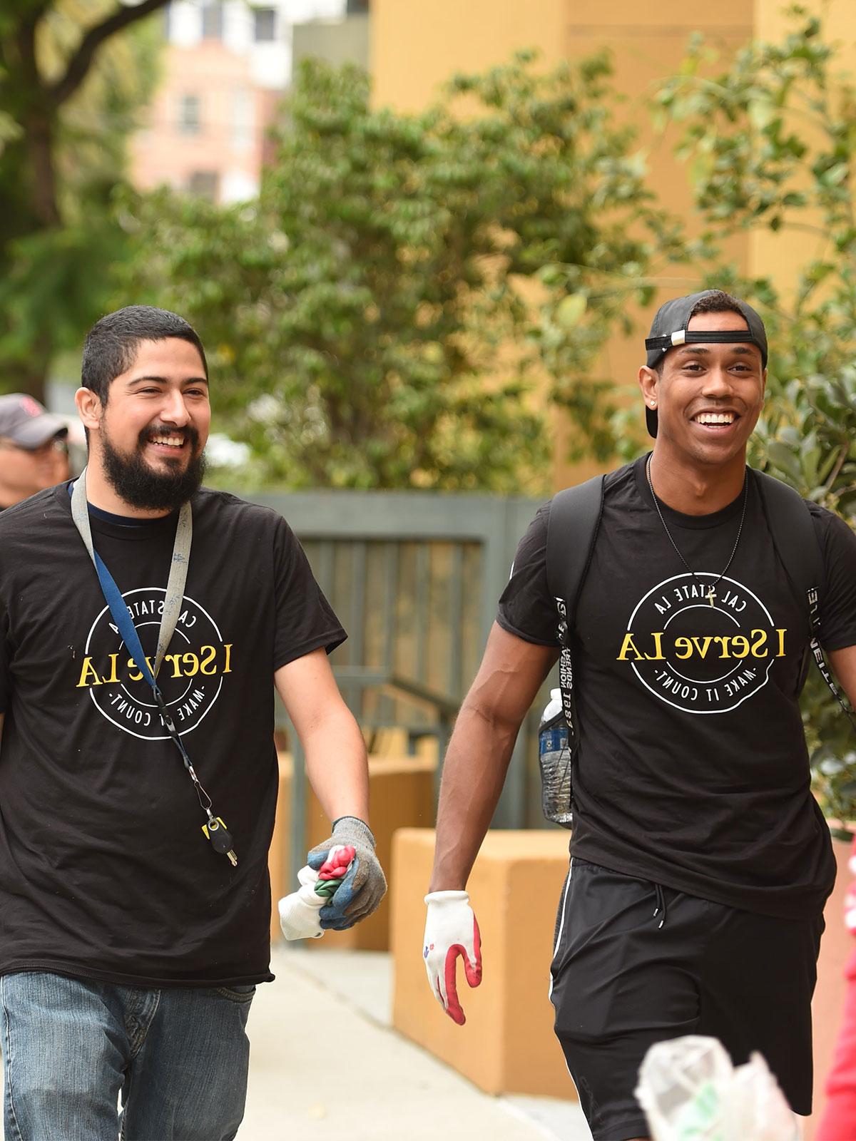 Two Cal State L.A. students walking together.